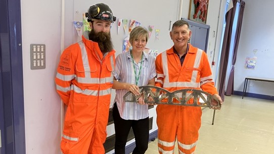 Local school receives a piece of history from engineers working on the restoration of the Barmouth viaduct: The replica was presented to the headteacher of Ysgol y Traeth