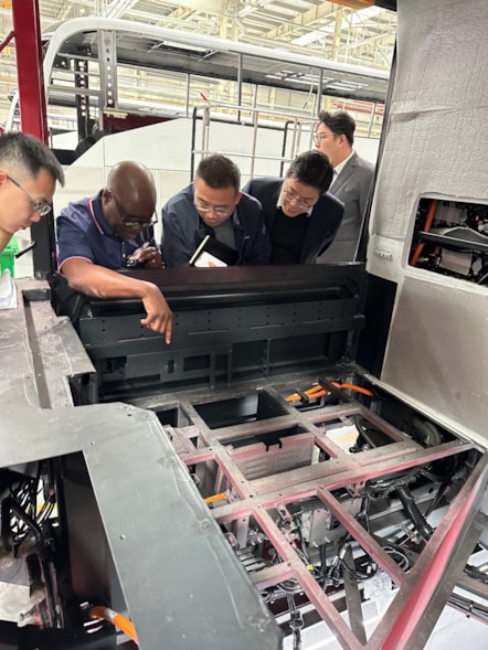 Peter Mambara inspecting Yutong at factory