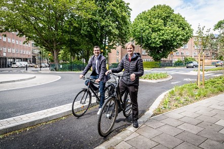 Cllr Champion and Will Norman by the new continental-style roundabout