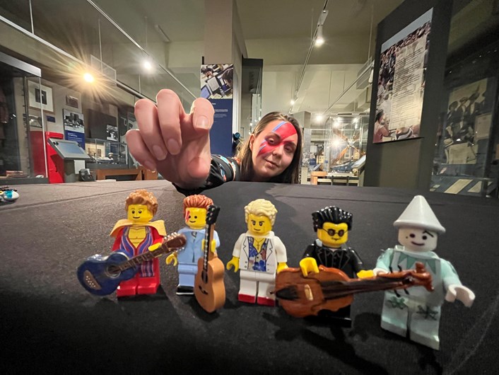 Bowie display at Leeds City Museum: Sapphia Cunningham-Tate, Leeds Museums and Galleries assistant community curator with specially created Lego figurines, each one capturing in minute detail one of the many changing faces adopted by the iconic singer, songwriter and actor David Bowie.