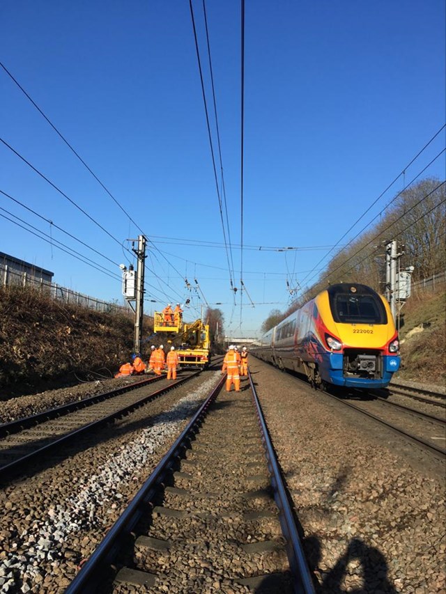 Train service running past work to repair overhead line equipment near Harpenden