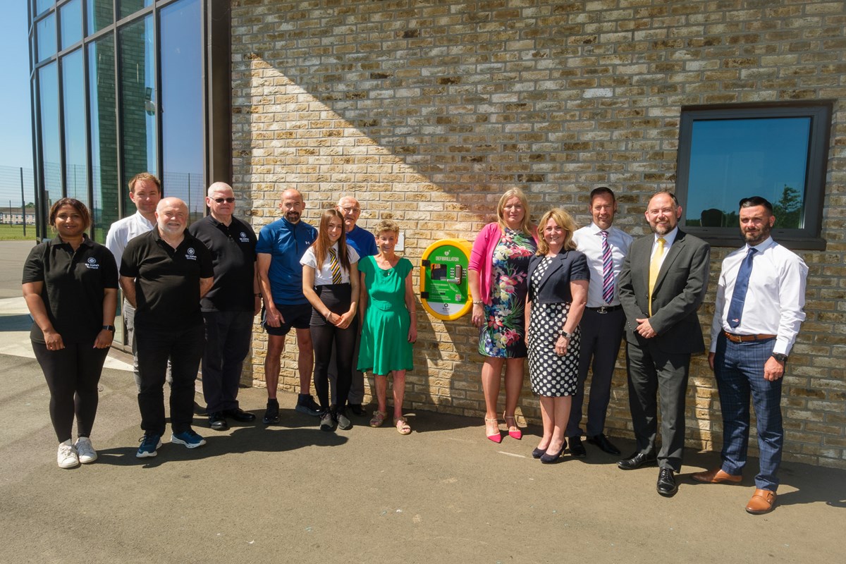 At the William McIlvanney Campus, Cllr Ingram joined the Henderson family, Jess Duncan from St John Scotland, Linda McAulay-Griffiths, Head Teacher David Rose, Mick Dickie from FPM and Scott Strachan from FES