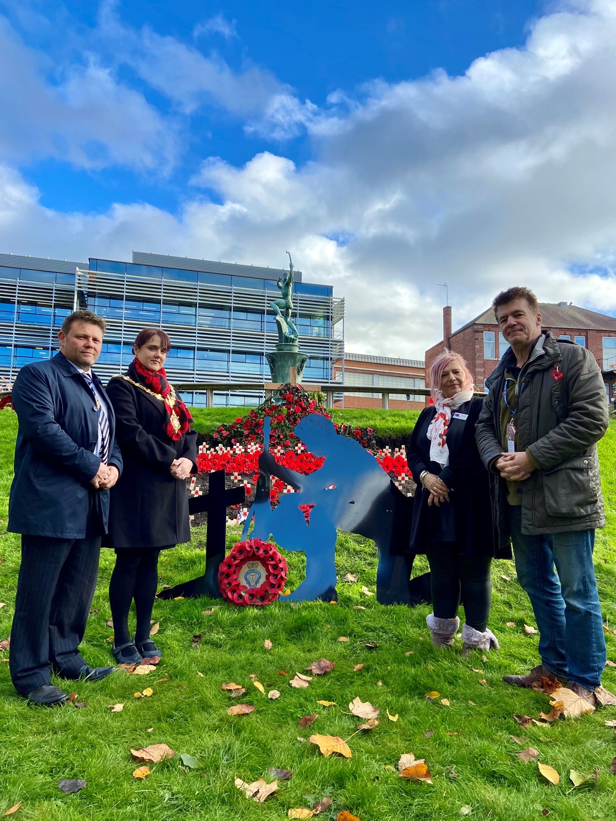 (left) Councillor Andrea Goddard, Mayor of Dudley and Councillor James Clinton, Mayor's consort with (right) Rose Cook-Monk poppy organiser,  and Andy Monk, volunteer.