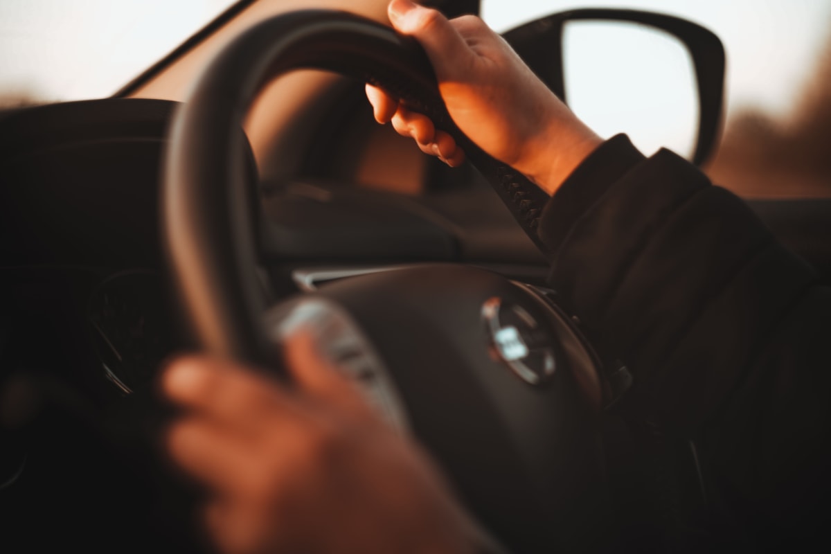 Hands on steering wheel