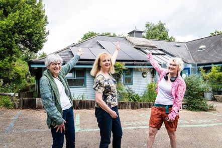 Volunteers celebrate the arrival of new solar panels at the Islington Ecology Centre