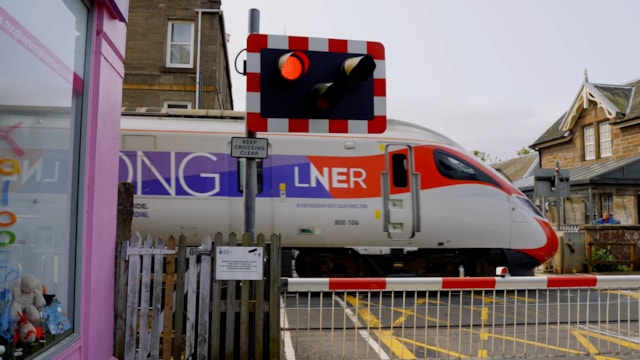 LNER train at Broughty Ferry level crossing: LNER train at Broughty Ferry level crossing