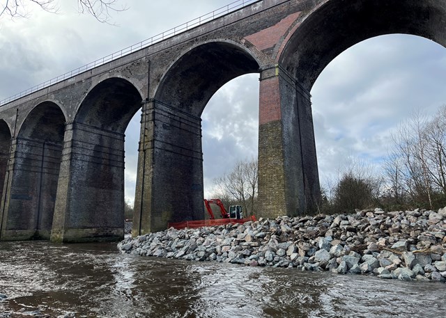 Reddish Vale viaduct with River Tame in the foreground