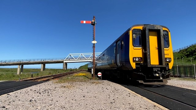 Northern train approaching Sellafield signal box
