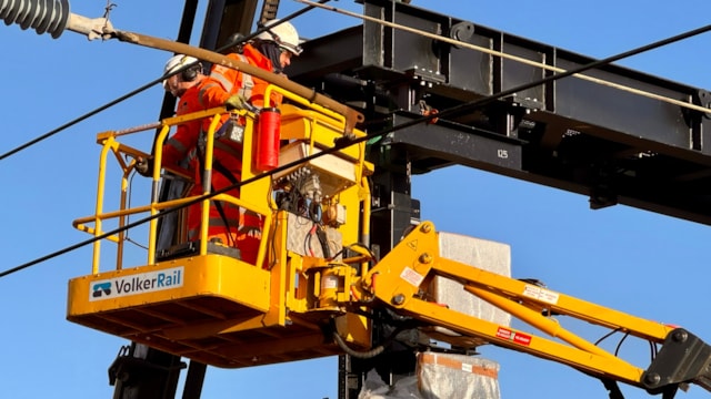 North West travel update ahead of late May bank holiday: Close up of team installing new signalling gangtry at Preston station January 2026
