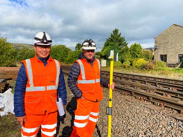 Rolando Navarro (L) and Colin Phillips (R) by the railway at Chinley signal box