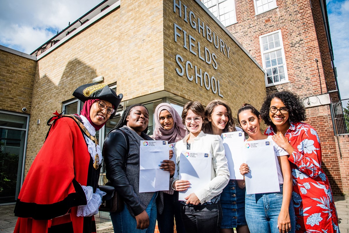 Highbury Fields School on A-level  results day with (L-R) Mayor of Islington, Cllr Rakhia Ismail; Iris Britwum; Maryam Begum; Luiza Sommariva; Jenna Cahusac de Caux; Begum Aksu; Executive member for Children, Young People & Families, Councillor Kaya Comer-Schwartz