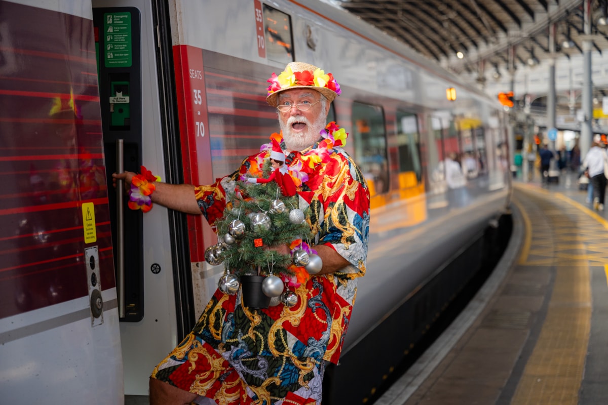 'Summer Santa' boarding LNER Azuma train
