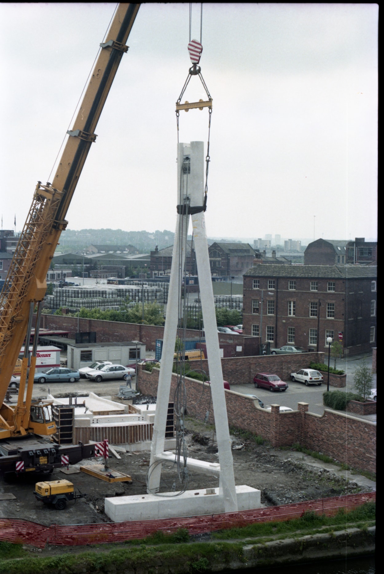 Centenary Bridge: Originally constructed in 1993, at that time the bridge was the first river crossing built in the city for more than a century, and its distinctive sweeping design has since become a much-loved riverside feature. Picture shows the bridge being winched into place during construction. Credit Yorkshire Design Group.