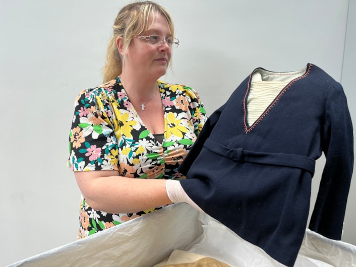 Sailor suits: Gemma Brown, site development officer at the Leeds Discovery Centre, with one of the eye-catching sailor suit style outfits in the Leeds collection.
The eye-catching naval attire includes a classic range of blue and white outfits, dresses and bellbottom trousers, looks which became hugely popular for children during the late 19th and early 20th centuries.
The suits are among an array of historic fashions which will be explored in an upcoming workshop at Leeds Discovery Centre looking back on centuries of fabulous clothes and costumes.