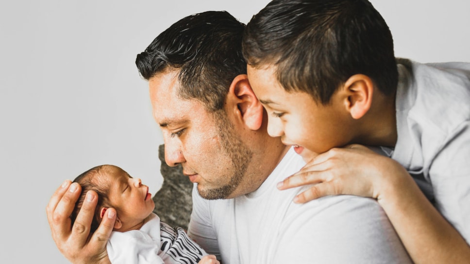 Dad with young children