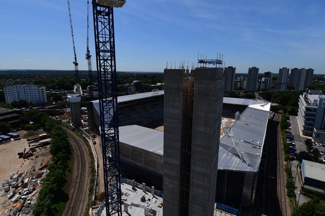 Brentford Football Stadium under construction by the railway