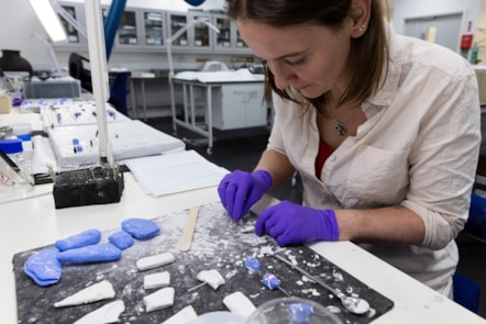 Conservator Bethan Bryan works on the Balgay necklace.  Photo © Duncan McGlynn (2)