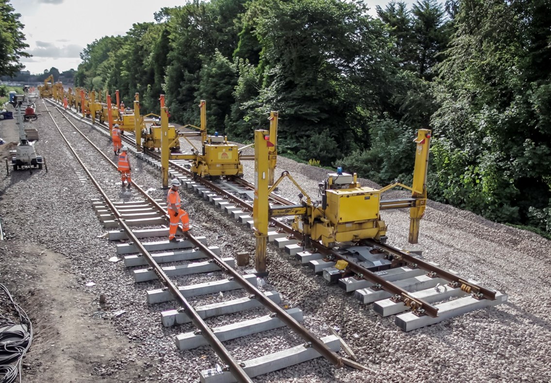 Network Rail staff laying track