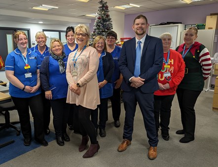 Cllr Matt Rogers, cabinet member for adult social care, with team manager Wendy Malpass (centre) and members of the authority's urgent care team