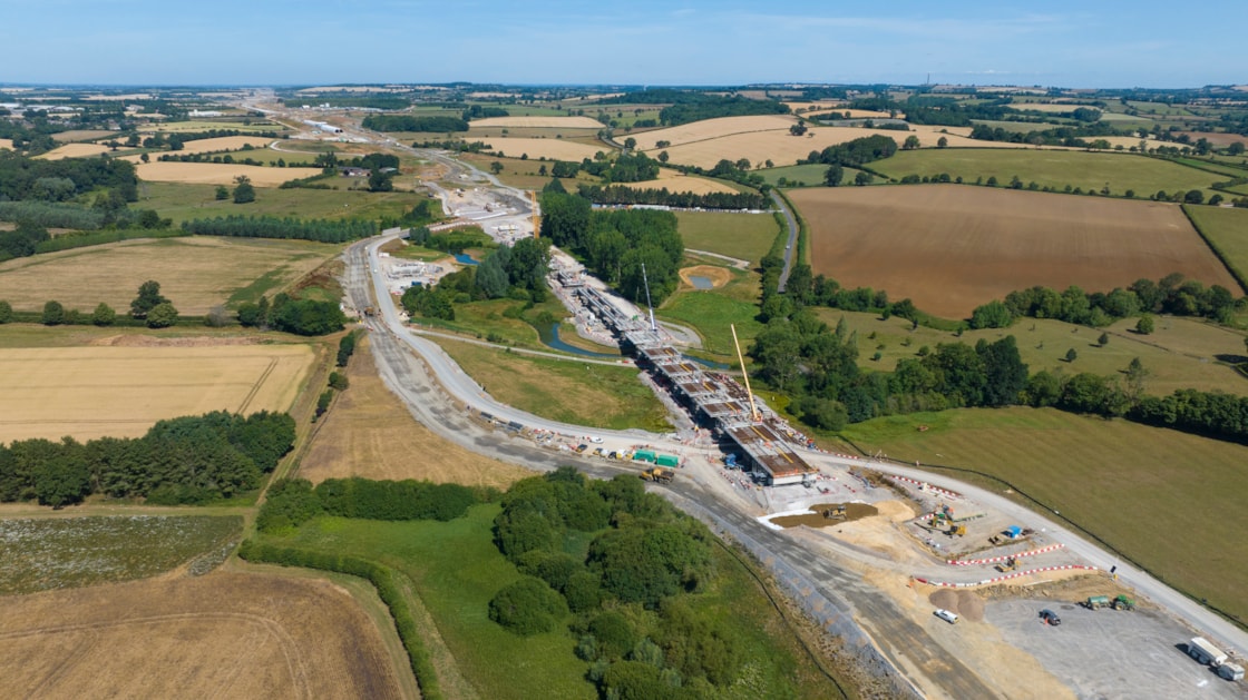 Edgcote viaduct uinder construction with the Chipping Warden green tunnel in the background July 2025