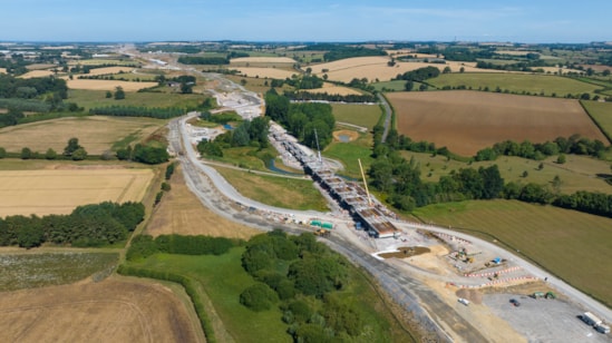 Edgcote viaduct uinder construction with the Chipping Warden green tunnel in the background July 2025