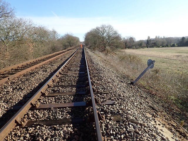Reminder: vital embankment work means 13 consecutive days of rail replacement on the East Suffolk Line: Signage slipping down the deteriorating embankment