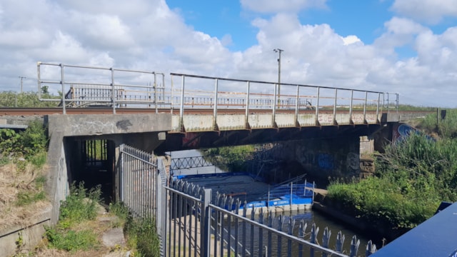 Passengers in Formby warned of upcoming rail closure for bridge rebuild: The bridge with a pontoon platform underneath in preparation for the work