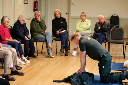 Paul Brolly teaching CPR to local residents