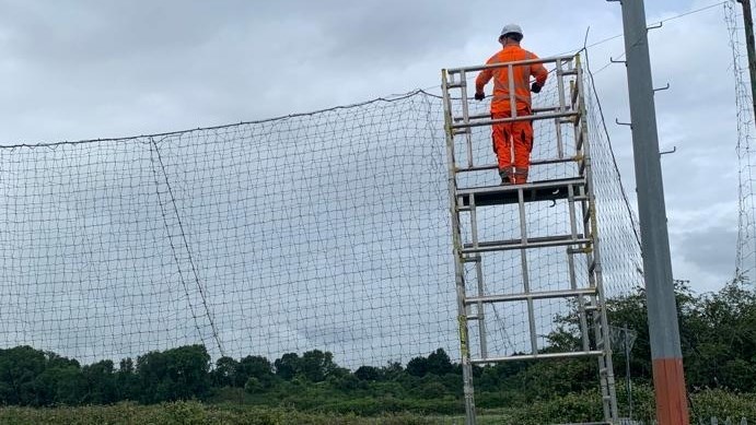 Fixing the netting at Manor Farm FC