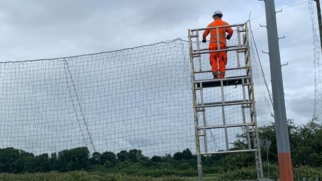 Fixing the netting at Manor Farm FC: Fixing the netting at Manor Farm FC