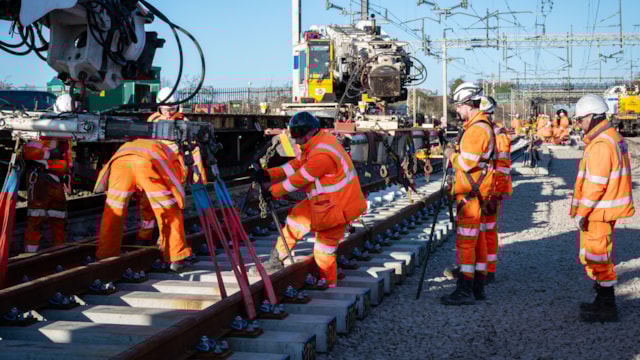 Central Rail Systems Alliance team lowering panel during Hanslope Junction renewal: Central Rail Systems Alliance team lowering panel during Hanslope Junction renewal
