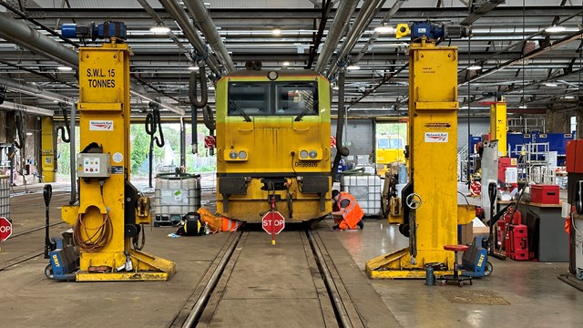 An MPV being refuelled and replenished inside Network Rail's seasonal delivery depot at Effingham