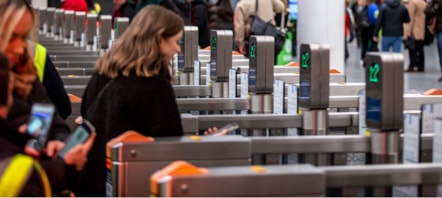 Image shows customer at ticket gateline