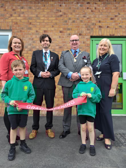 Pictured on the back row from left to right in front of the plaque at the official opening of the new facilities at Lea Community Primary School are Sophie Inman, school business manager, County Councillor Matthew Salter, cabinet member for Education and Skills, County Councillor and LCC chairman Al