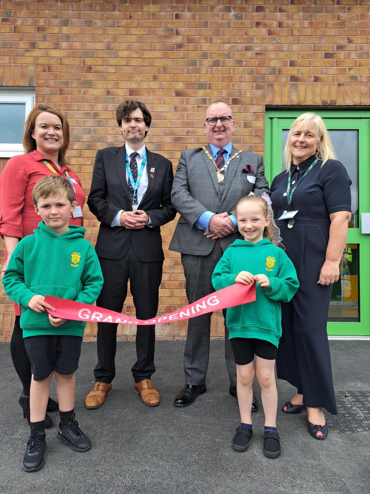 Pictured on the back row from left to right in front of the plaque at the official opening of the new facilities at Lea Community Primary School are Sophie Inman, school business manager, County Councillor Matthew Salter, cabinet member for Education and Skills, County Councillor and LCC chairman Alf Clempson, headteacher Lynne Slater, and on the front row from left to right are reception pupils Stanley and Cara.