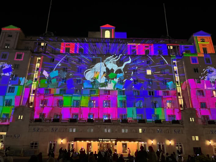 Light Night 2025: Among the captivating artworks which lit up the city last night was a spellbinding projection on City Square’s iconic Queens Hotel Entitled One Second Lovestory, created by German artist Dirk Rauscher.
Celebrating 200 years of the modern railway, the piece captures a romantic moment in time when two people’s eyes meet at a busy train station and is sponsored by Markel.