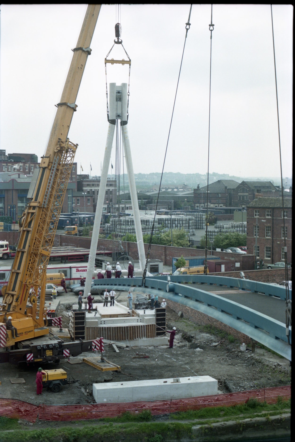 Centenary Bridge: Originally constructed in 1993, at that time the bridge was the first river crossing built in the city for more than a century, and its distinctive sweeping design has since become a much-loved riverside feature. Picture shows the bridge being winched into place during construction. Credit Yorkshire Design Group.