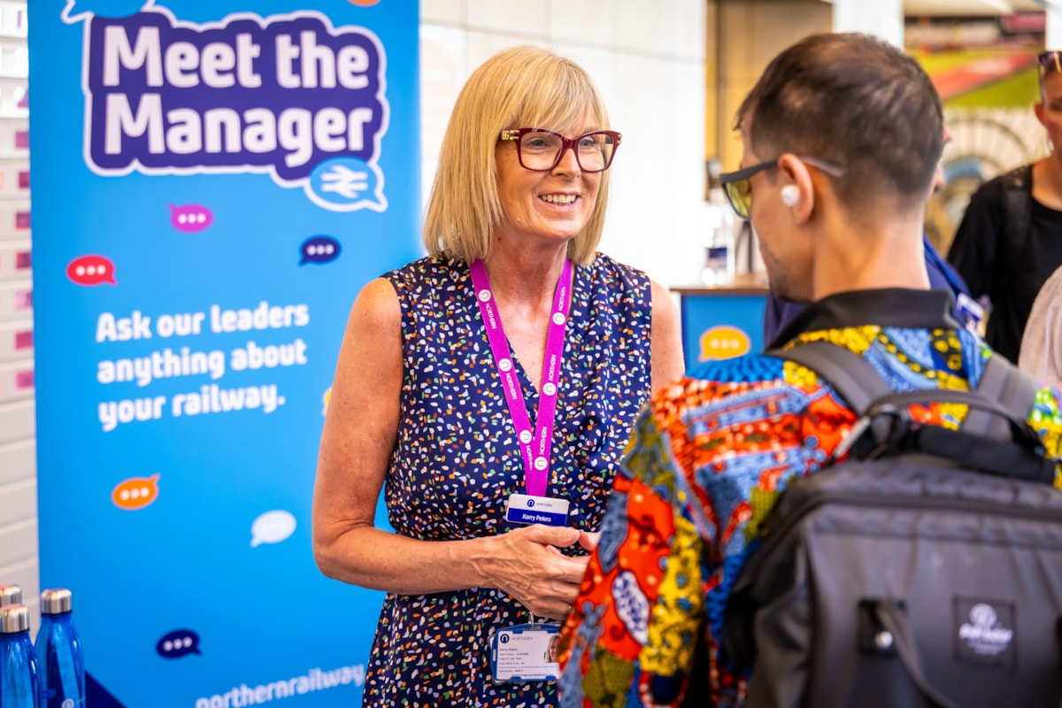 A customer speaks to Kerry Peters, Director of Stations at Northern