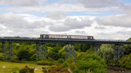 An image of a Northumberland Line service crossing the North Seaton Viaduct