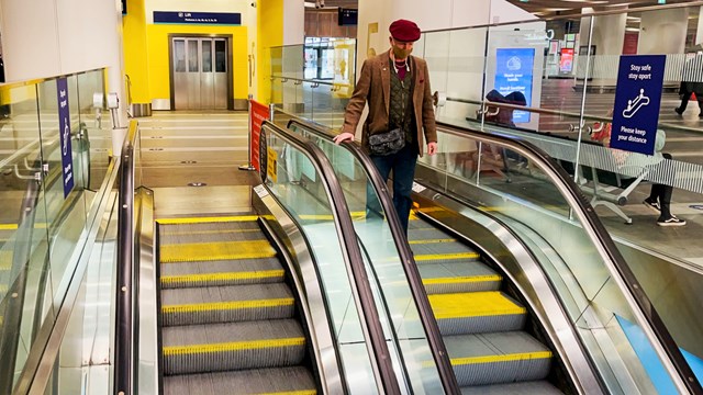 Tests show no traces of Covid-19 at Birmingham New Street station: Birmingham New Street escalator handrail stock shot