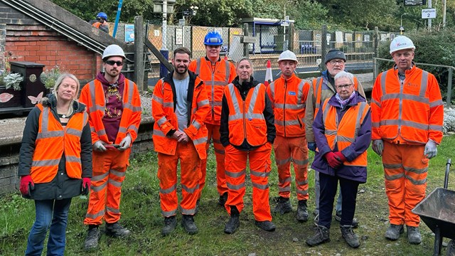 Green-fingered volunteers spruce up award-winning station garden: The Hindley garden volunteers