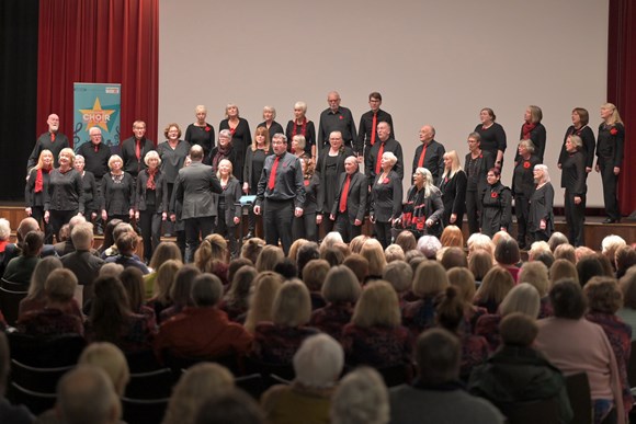 Blackburn People's Choir performing on the night