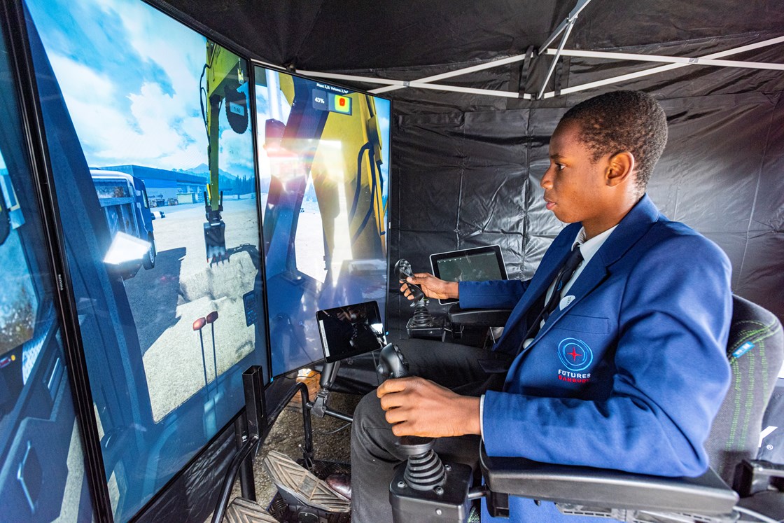 Pupil from Futures Academy trying up an excavator simulator