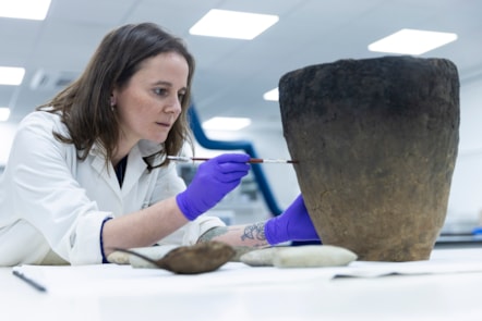 National Museums Scotland conservator Bethan Bryan works on the Bronze Age Achmore Vessel, 1000 - 500 BC. Image © Duncan McGlynn-2
