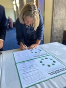 Clare Martin, Chief Executive Officer, Pompey In The Community: Clare Martin, Chief Executive Officer, Pompey In The Community signing the Portsmouth Green Partnership Charter