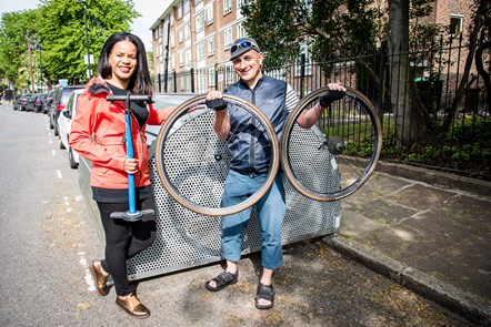 Cllr Claudia Webbe, executive member for environment and transport, celebrates the installation of the 100th on-street Bike Hangar in Islington with the council's active travel manager David Shannon
