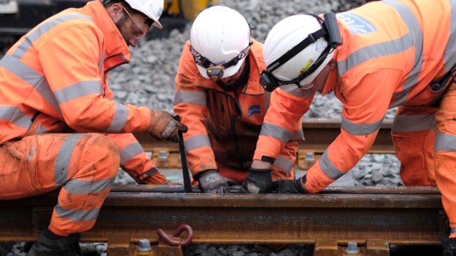 Workers upgrading the track in Crewe: Workers upgrading the track in Crewe