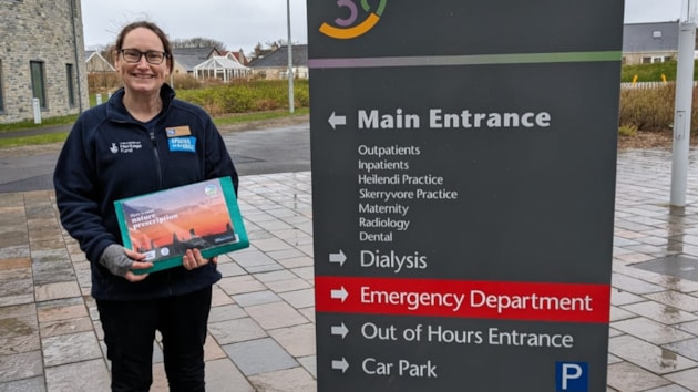 NHS Orkney roll out ‘Nature Prescriptions’ following success in Shetland and Edinburgh: Sam Stringer with Nature Calendar, St Margarets Hope 2 (c) Sarah Duly, NatureScot-2