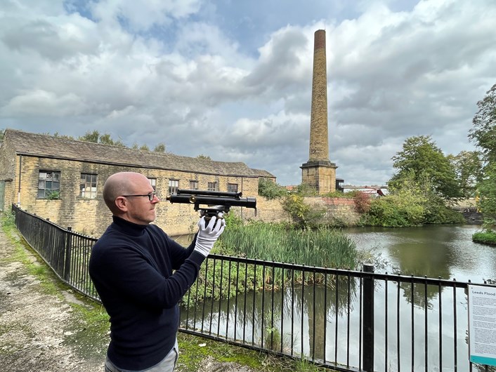 Engineery at Leeds Industrial Museum: Curator John McGoldrick at Leeds Industrial Museum with a vintage theodolite, used for measuring and surveying.