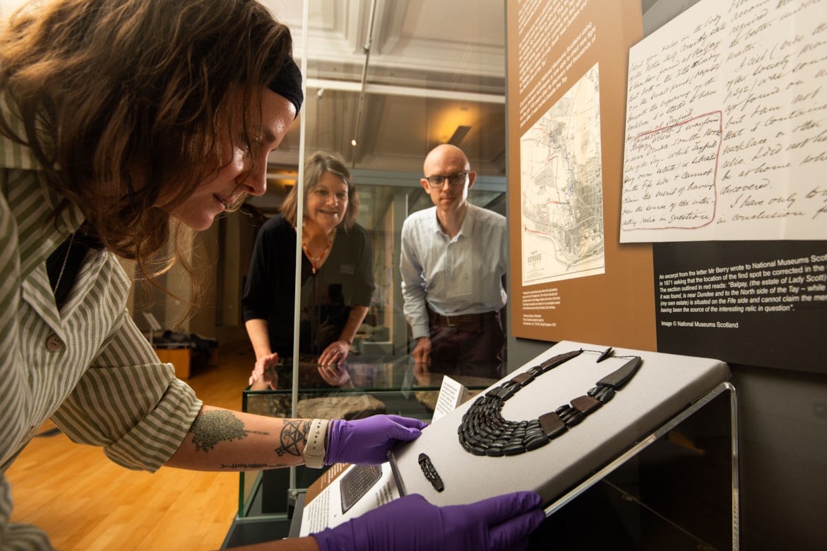 Curators and conservators install a 4000-year-old Bronze Age necklace at The McManus in Dundee. Photo (c) Alan Richardson (1)